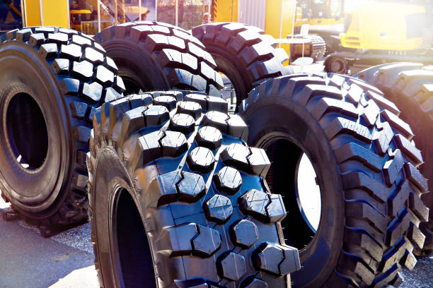 istock Rubber tire black on construction transport 1566920632