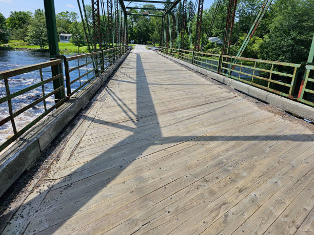 istock Wooden Bridge Crossing 1566951260