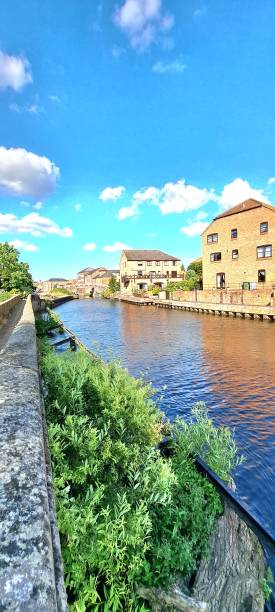 istock River bank with houses 1566965542