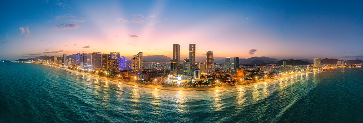Drone view panorama Nha Trang city from the sea in a cloudy day, Khanh Hoa province, central Vietnam