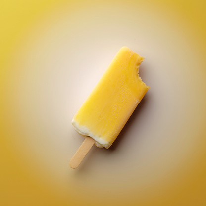 Creamsicle sitting on a circular gradient background