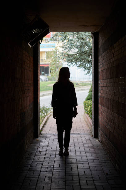 istock long haired lady full length silhouette in passage 1566989861