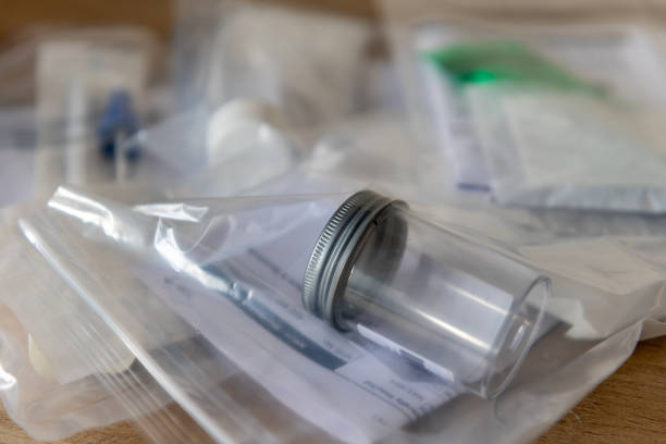 istock A pile of sample containers and request forms for medical test. 1566990394
