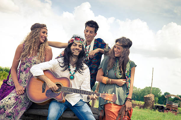 istock Hippie group play guitar together 156699147