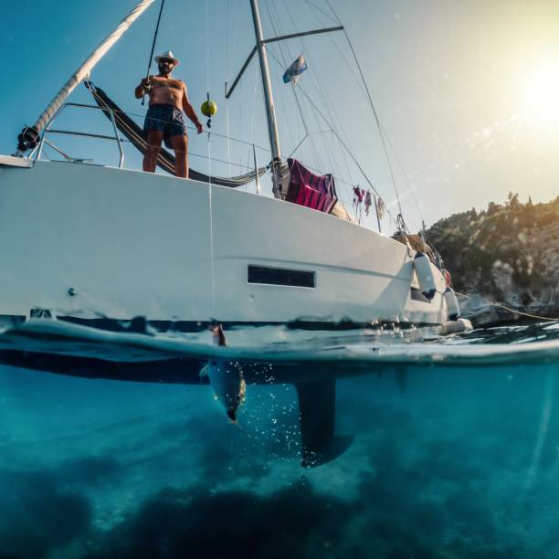istock Man fishing on a boat 1567034757