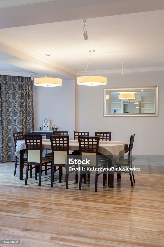 Wooden table Wooden table and chairs in dining room Apartment Stock Photo