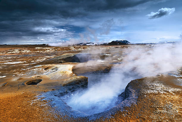 Steaming Mudpot HDR shot of boiling mudpots and steaming fumaroles at Hverir, a highly active geothermal area in Northern Iceland. fumarole photos stock pictures, royalty-free photos & images