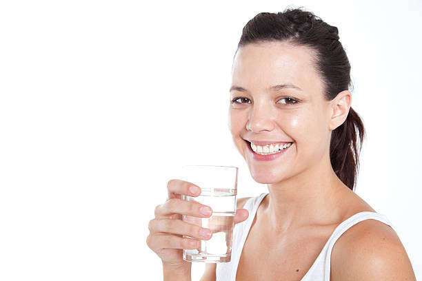 istock Beautiful healthy girl drinking water 156707651
