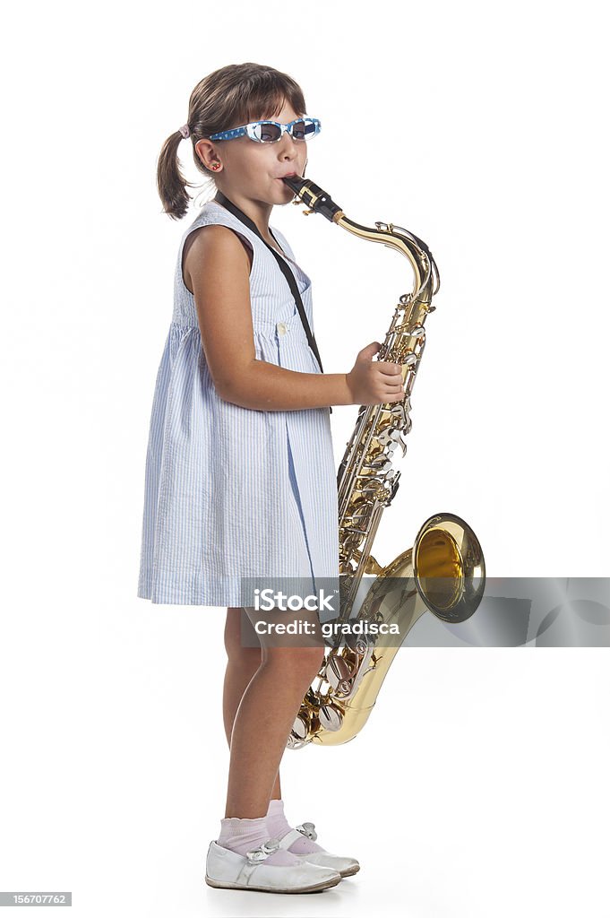 Menina a tocar música de Saxofone - Royalty-free Aluno de Jardim de Infância Foto de stock