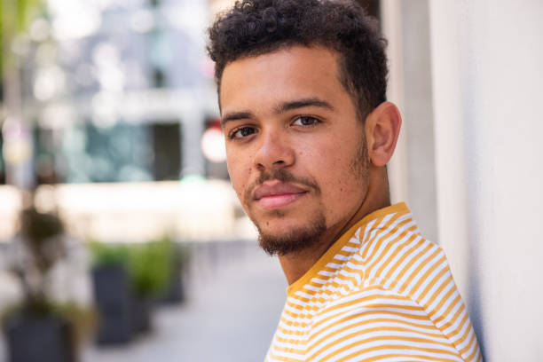istock side portrait serious young mixed race african american man with beard 1567083287