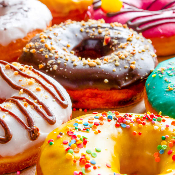 istock donuts in multicolored glaze close-up 1567084422