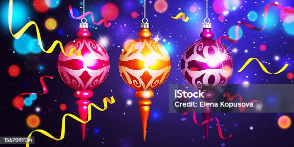 istock New Year celebration concept in private style. Set of colorful Christmas balls with confetti on an abstract colorful festive background with bokeh effect and shimmering particles. 1567091134