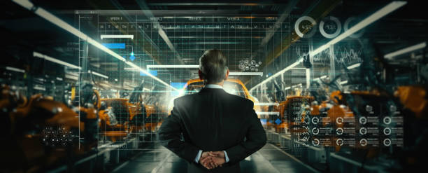 istock Engineer manager working with Ai computer virtual on The robotic arm of the car production plant is working. 1567110162