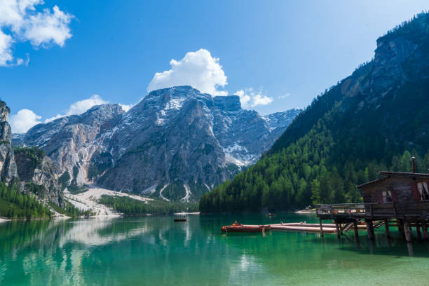 istock The lake is clear, sometimes green, sometimes blue, and surrounded by mountains. 1567110729