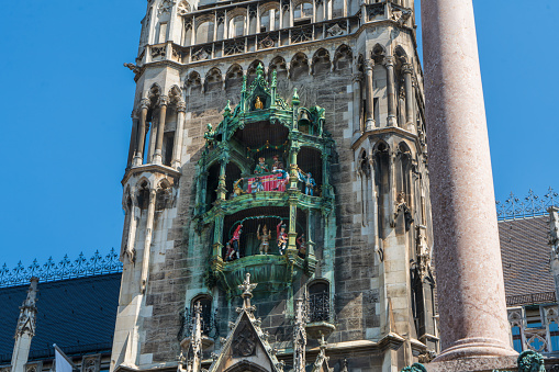 The towering bell tower. The most famous puppet clock show in the world. Must-see sights at Marienplatz in the Old Town of Munich, Germany.