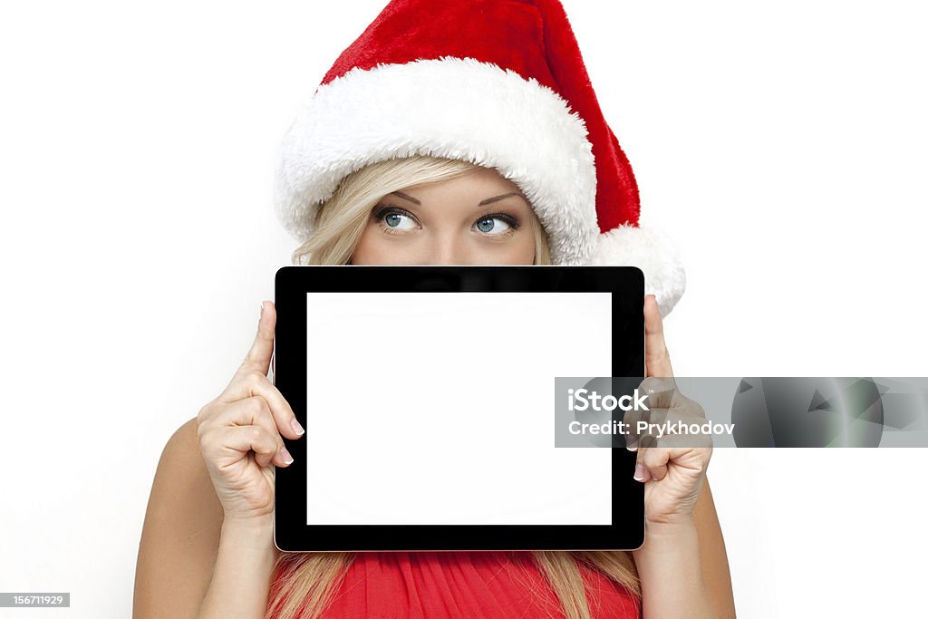 Menina com um chapéu de Natal vermelho, segurando a tablet touch - Royalty-free Adulto Foto de stock