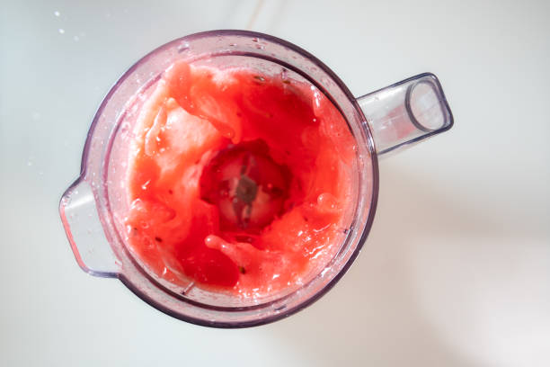 water melon in the food processor view from above stock photo