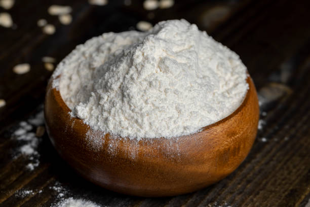 istock Wheat flour from a wooden bowl 1567159480