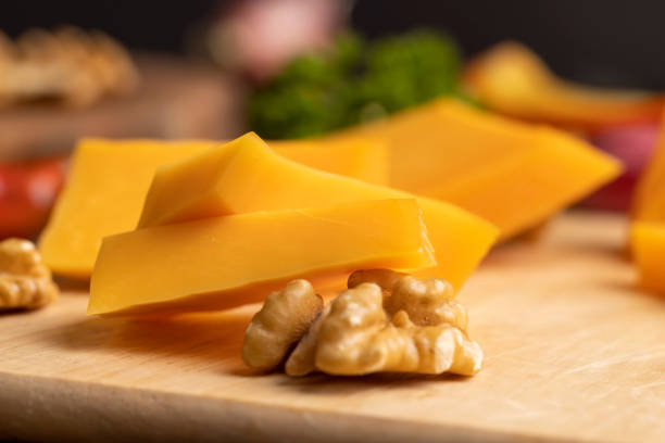 istock Sliced hard cheese made from milk 1567160134