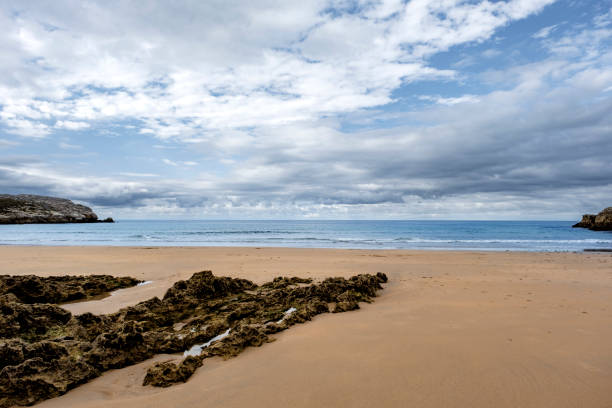 istock Beautiful and quiet sandy beach in the Cantabrian Coast 1567167320