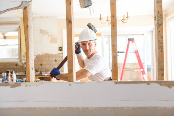 istock Construction Worker Building renovation an old house 1567175129
