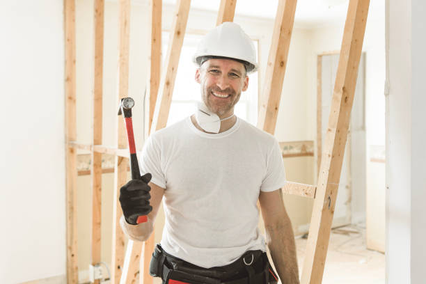 istock Construction Worker Building renovation an old house 1567175703