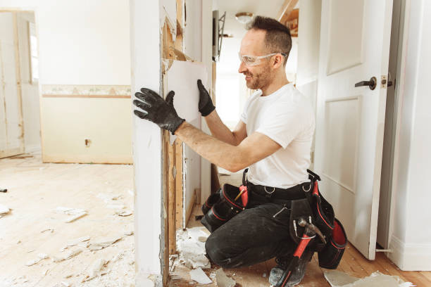 istock Construction Worker Building renovation an old house 1567175714