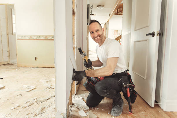 istock Construction Worker Building renovation an old house 1567175717