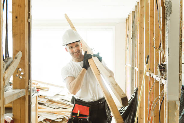 istock Construction Worker Building renovation an old house 1567175752