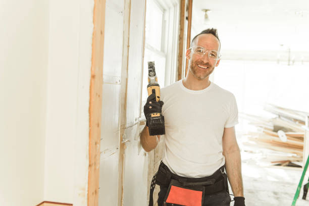 istock Construction Worker Building renovation an old house 1567176283