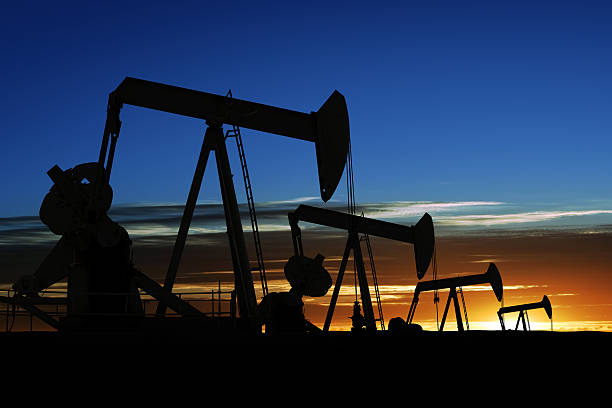 istock XXXL pumpjack silhouettes 156718324