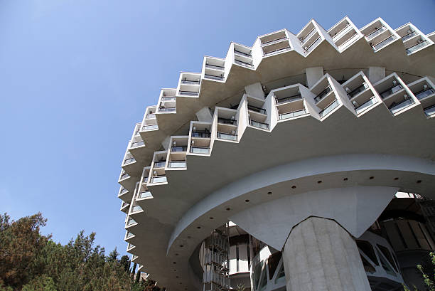 istock contemporary concrete round building 156722020