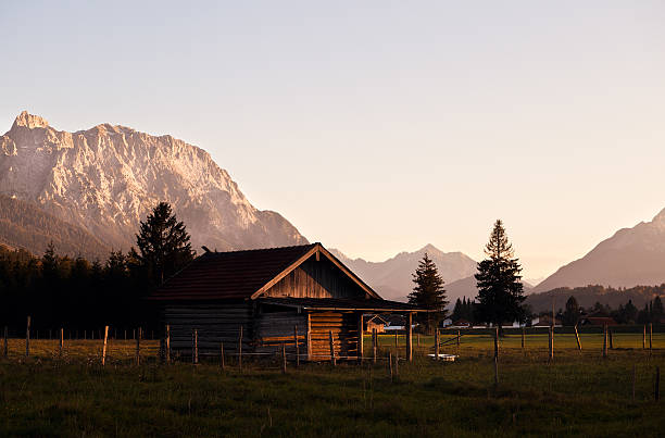 istock alpine wooden house before sunset 156722149