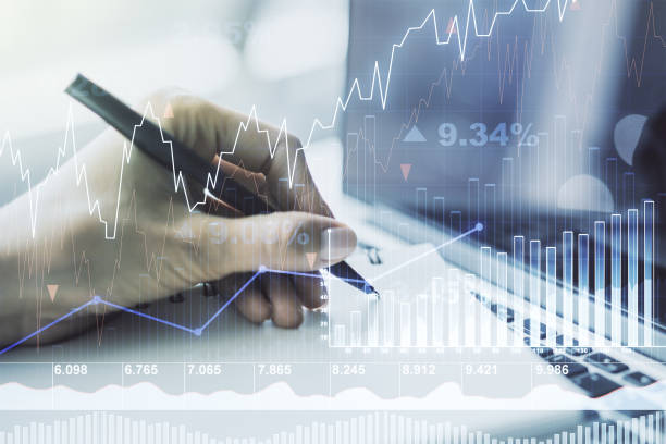 istock Double exposure of abstract creative financial diagram with hand writing in notebook on background, banking and accounting concept 1567222203