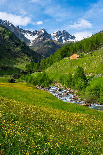 Alpine mountain landscape along the Timmelsjoch high mountain pass during a beautiful springtime day in the Italian Alps of South Tirol.