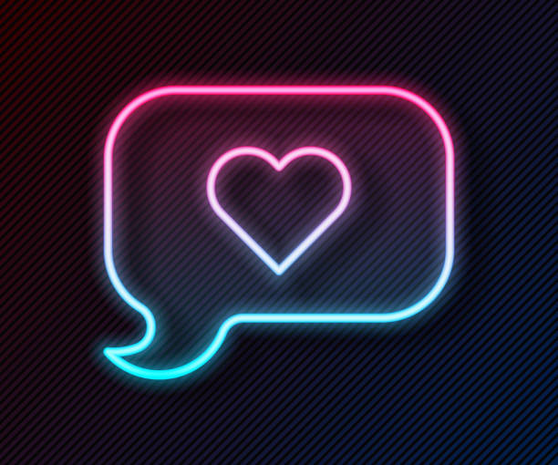 istock Glowing neon line Heart in speech bubble icon isolated on black background. Happy Valentines day. Vector 1567258153