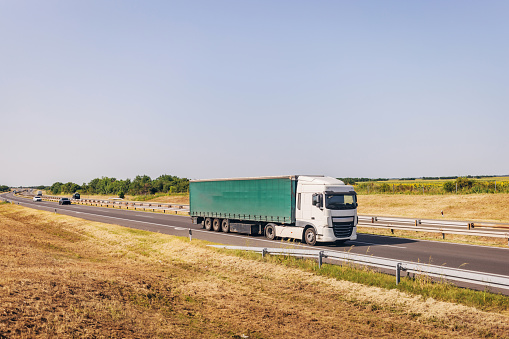 Cars and trucks on highway