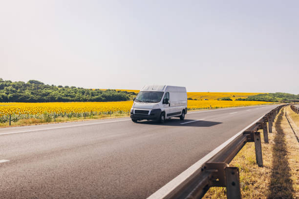 istock Cars and trucks on highway 1567286233