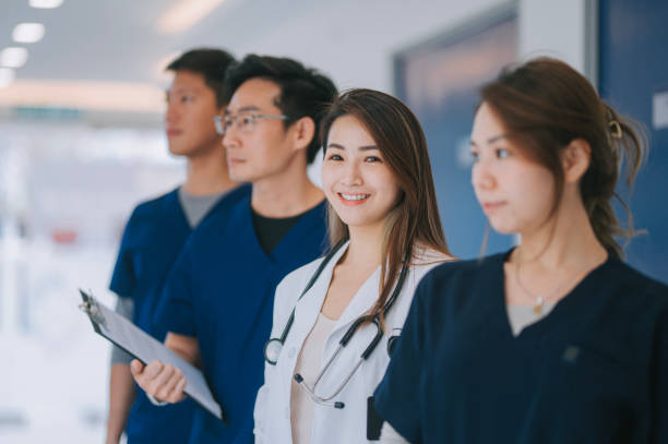 istock portrait asian chinese doctors nurses in a row 1567296850