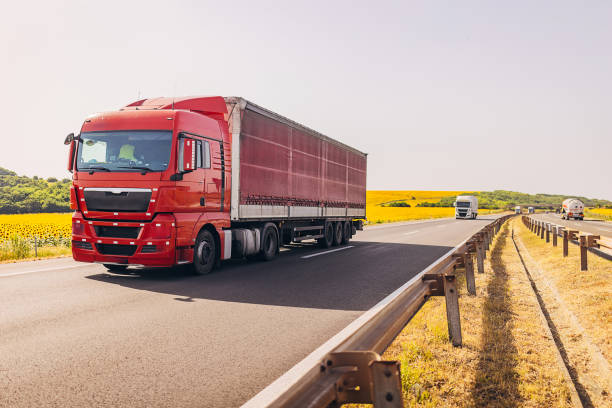 istock Cars and trucks on highway 1567300150