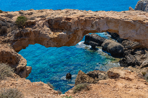Kamara tou Koraka, natural bridge, rock arch situated near the coastal cliffs of Ayia Napa, natioanl park Cape Greco, Cyprus