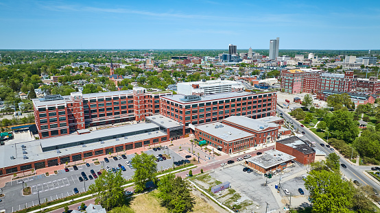 Image of Aerial old General Electric Works factory building refurbished near park in downtown Fort Wayne