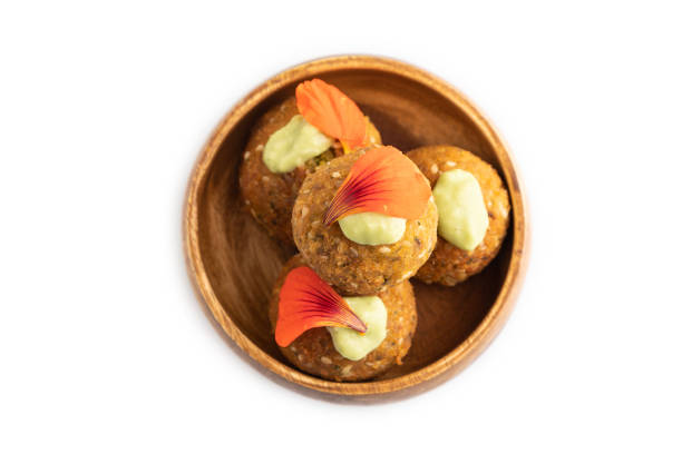 Falafel with guacamole isolated on white. Top view.