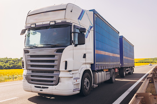 Cars and trucks on highway