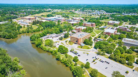 Image of Aerial PFW college campus St Joseph River view of buildings with distant dorm rooms in summer