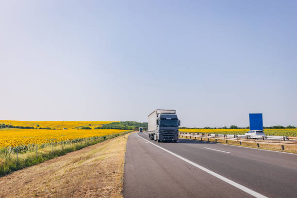 istock Cars and trucks on highway 1567330614