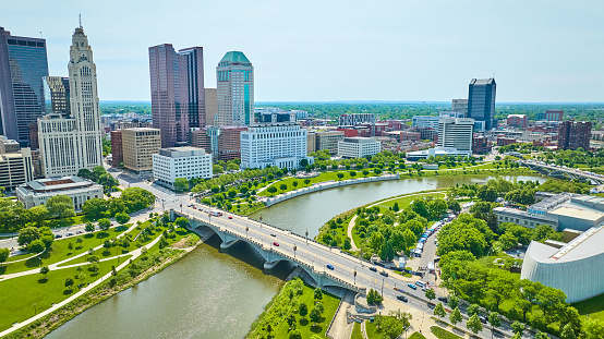 Image of Bridge from Center of Science and Industry to skyscrapers in downtown Columbus Ohio aerial