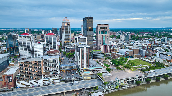 Image of Downtown city aerial Louisville Kentucky skyscrapers showing Ohio River shoreline
