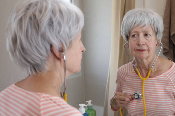 Comedic senior woman using a stethoscope