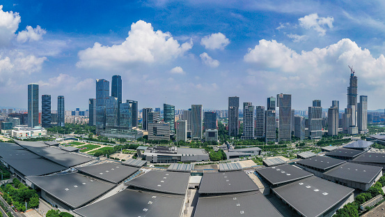 This is the aerial photo of Nanjing finance center with blue sky and clouds.